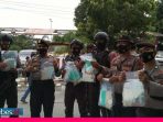 Antisipasi Corona Saat Pengamanan di KPU, Personil Polres Palu Dibekali APD